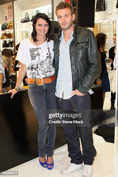 Personality Kim Stolz and Model Brad Kroenig with Ford Models attend the celebration for Fashion's Night Out at ALDO on September 10, 2009 in New...