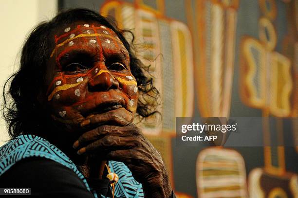 Australian indigenous artist Jean Baptiste Apuatimi, from Melville Island, attends the opening the largest contemporary indigenous art exhibition...