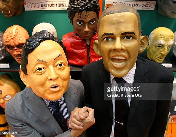 Japanese rubber mask maker Ogawa Rubber Inc. President Hirohisa Ogawa and Executive Director Takahiro Yagihara wear rubber masks of Japanese Prime...