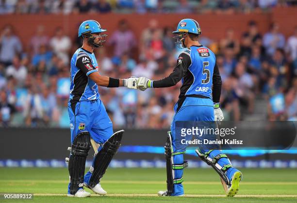 Jake Weatherald of the Adelaide Strikers and Alex Carey of the Adelaide Strikers react during the Big Bash League match between the Adelaide Strikers...