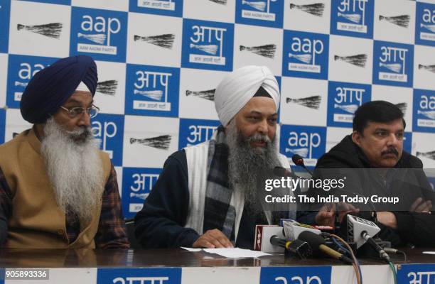 Rajya Sabha MP Sanjay Singh with AAP leader Jarnail Singh addresses a press conference at AAP office in New Delhi.