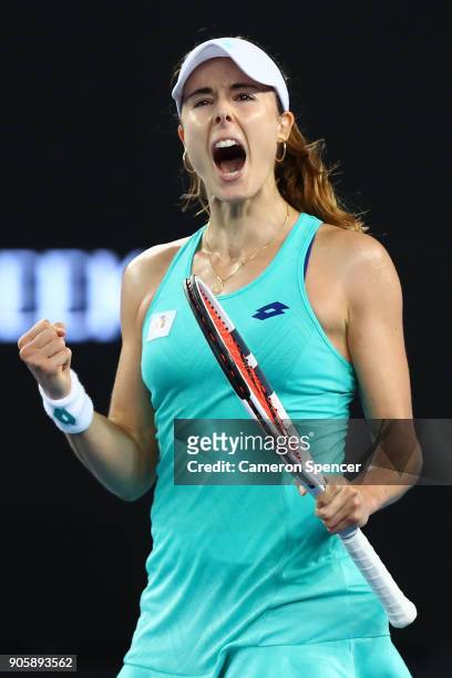 Alize Cornet of France celebrates winning match point in her second round match against Julia Goerges of Germany on day three of the 2018 Australian...
