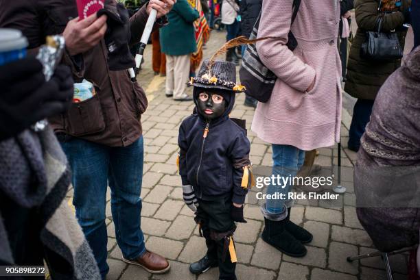 Whittlesey: . Straw Bear Festival. Hedley Fisher, aged 5 and a fan of The Witchmen Morris dancers, stands among the crowds to watch The Witchmen...