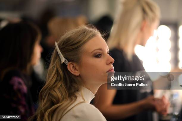 Models prepare backstage ahead of the Sportalm show during the MBFW January 2018 at ewerk on January 17, 2018 in Berlin, Germany.
