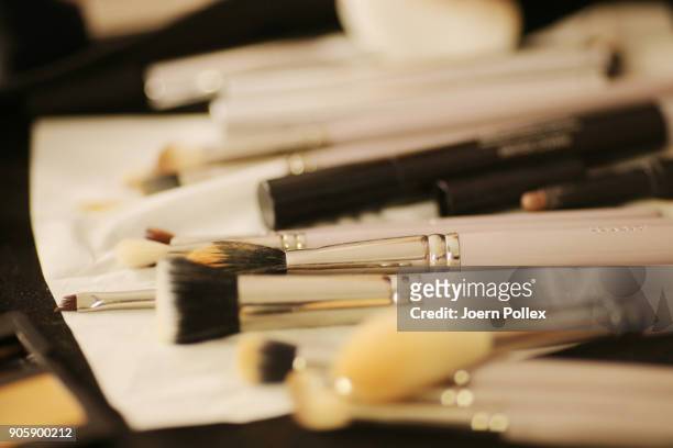 Makeup artists working backstage ahead of the Sportalm show during the MBFW January 2018 at ewerk on January 17, 2018 in Berlin, Germany.