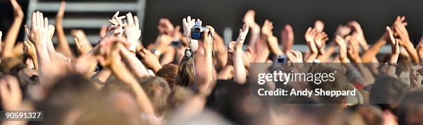 General view of the crowd raising their arms and clapping at Hard Rock Calling 2009 in Hyde Park on June 28, 2009 in London, England.