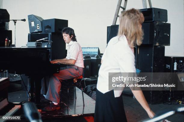 Wings rehearsing at Sydney Myer Music Bowl, November 13 Melbourne, AUnited Statestralia. Paul McCartney, Linda McCartney.