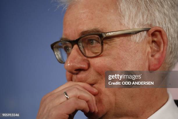 Polish Foreign Minister Jacek Czaputowicz reacts during a joint press conference with his counterpart German Foreign Minister Sigmar Gabriel after a...