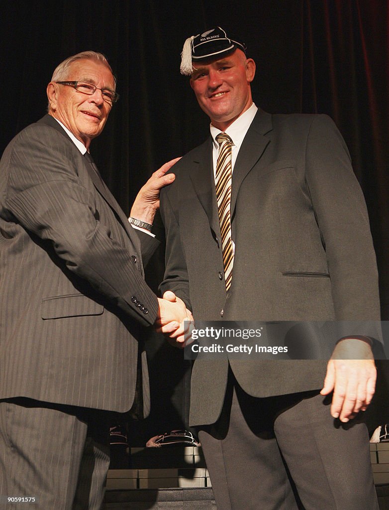 Getting Capped All Black Mark Cooksley is capped by NZRU President John Sturgeon ...