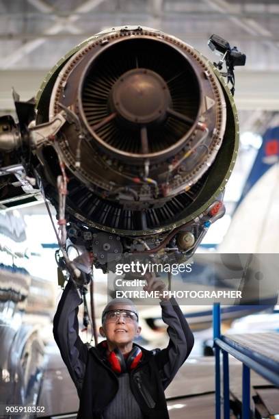 Aircraft mechanic in the hangar