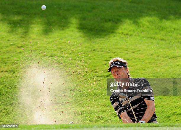 Bernhard Langer of Germany plays his bunker shot on the sixth hole during the second round of The Mercedes-Benz Championship at The Gut Larchenhof...