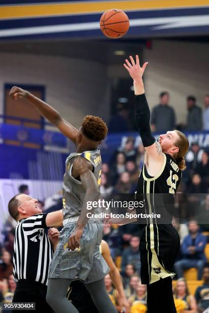 Western Michigan Broncos center Drake LaMont wins the opening tip against Kent State Golden Flashes forward Danny Pippen during the first half of the...