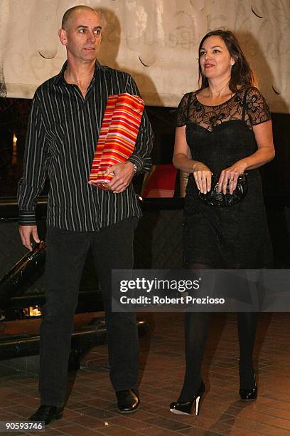 Media personality Rob Sitch and his wife Jane Kennedy arrive to celebrate Shane Warne's 40th Birthday at Cristal cocktail and Champagne bar on...