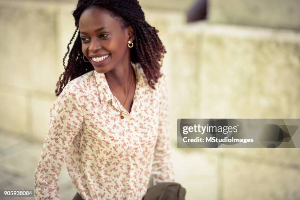 smiling african woman. - beautiful nigerian women stock pictures, royalty-free photos & images