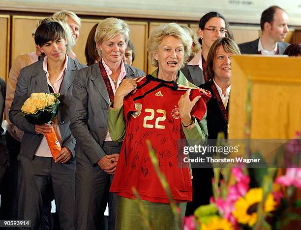 Petra Roth, major of Frankfurt receives a shirt with autographs during the Womens national team celebration of the Euro 2009 victory at the Frankfurt...