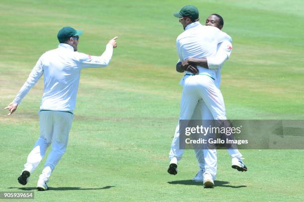Faf du Plessis, Kagiso Rabada and AB de Villiers of the Proteas celebrate the wicket of Rohit Sharma of India during day 5 of the 2nd Sunfoil Test...