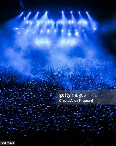 Massed crowd of fans watches the main stage lightshow on Day 2 of Reading Festival 2009 on August 29, 2009 in Reading, England.