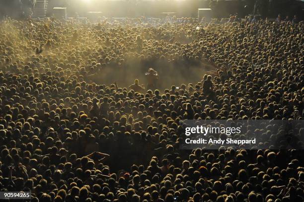 Massed fans in the crowd with a moshpit cleared in the centre in front of the main stage on Day 2 of Reading Festival 2009 on August 29, 2009 in...