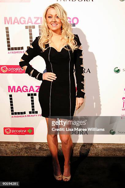 Singer Cassie Davis arrives for the VIP Launch Party for 'Magazines Go Live' as part of the 30 Days of Fashion at the Royal Hall of Industries on...