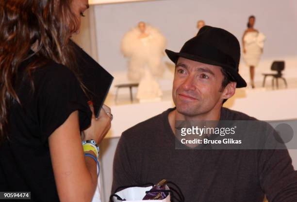 Hugh Jackman visits Jeffrey New York during "Fashion's Night Out" to sign tee-shirts and greet fans on September 10, 2009 in New York City.