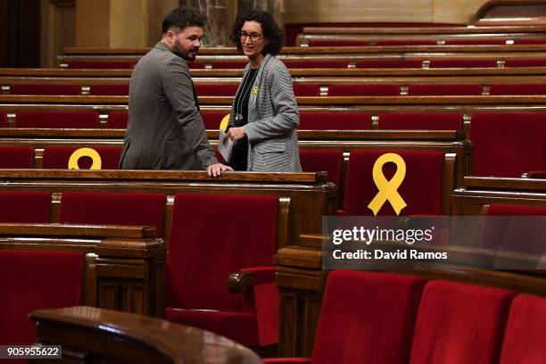 Spain's MP Gabriel Rufiand and Catalonia's MP Marta Rovira both of the pro-independence party Esquerra Republicana de Catalunya speak next to yellow...