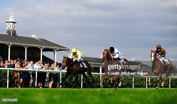Ryan Moore rides Pollenator to victory during the DFS May Hill Stakes at Doncaster Racecourse on September 11, 2009 in Doncaster, England.