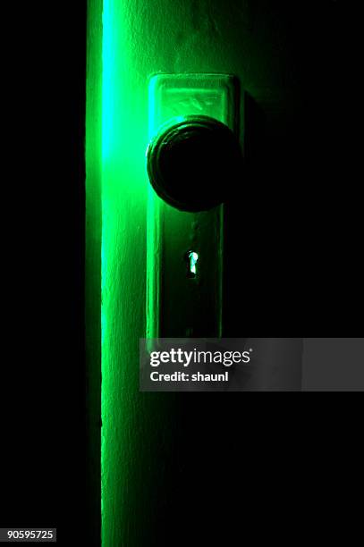 mystery door - key hole stock pictures, royalty-free photos & images