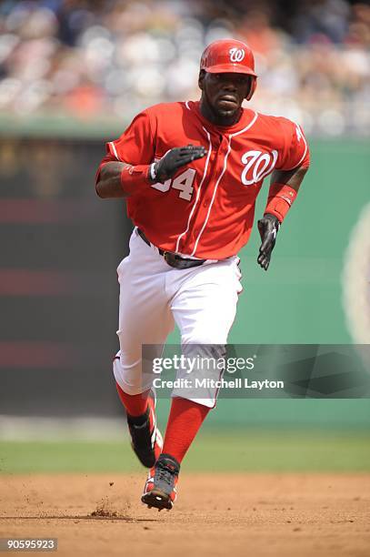 Elijah Dukes of the Washington Nationals runs to third base during a baseball game against the Florida Marlins on September 6, 2009 at Nationals Park...