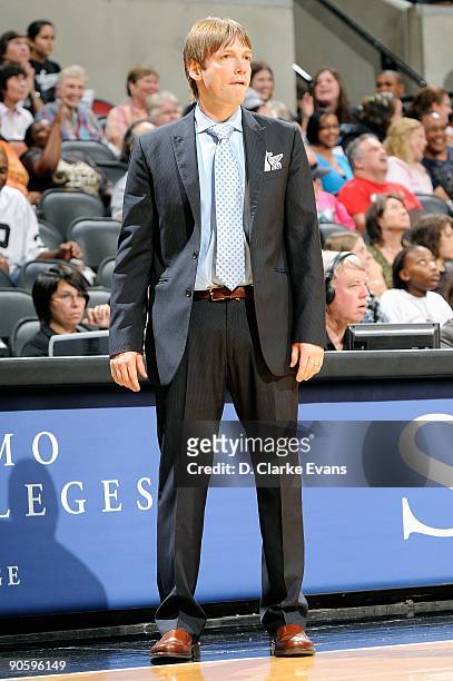 Assistant coach Olaf Lange of the San Antonio Silver Stars watches the action from the side line during the WNBA game against the Minnesota Lynx on...