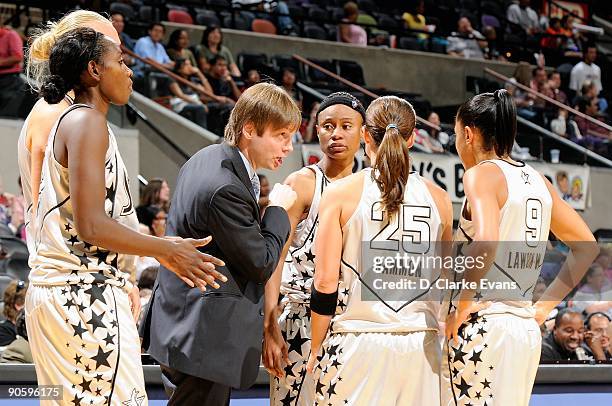 Assistant coach Olaf Lange of the San Antonio Silver Stars huddles with his players during the WNBA game against the Minnesota Lynx on September 1,...