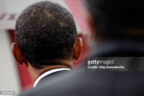 Drops of rain cling to the earlobes of U.S. President Barack Obama during a 9/11 Rememberance Ceremony at the Pentagon September 11, 2009 in...