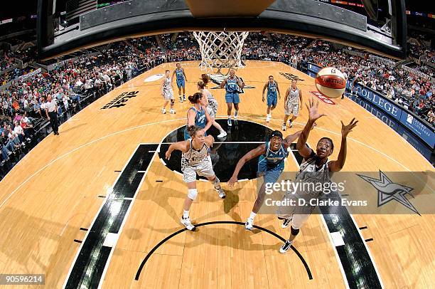 Sophia Young of the San Antonio Silver Stars goes after a rebound over Quanitra Hollingsworth of the Minnesota Lynx during the WNBA game on September...