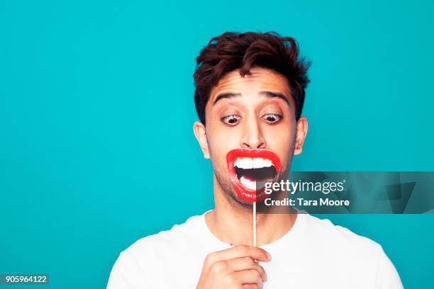 man shouting and making face - guardare verso il basso foto e immagini stock