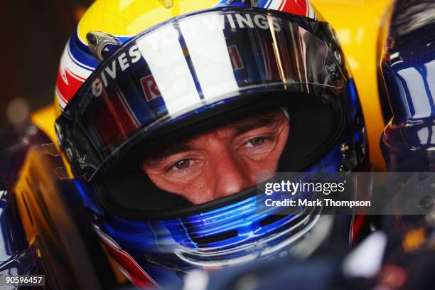 Mark Webber of Australia and Red Bull Racing prepares to drive during practice for the Italian Formula One Grand Prix at the Autodromo Nazionale di...