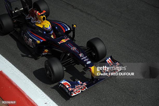 Red Bull's Australian driver Mark Webber drives at the Autodromo Nazionale circuit on September 11, 2009 in Monza, during the second free practice...