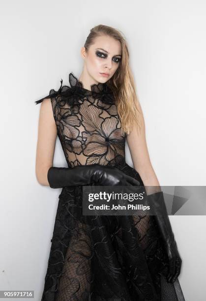 Model poses backstage ahead of the Irene Luft show during the MBFW January 2018 at ewerk on January 17, 2018 in Berlin, Germany.