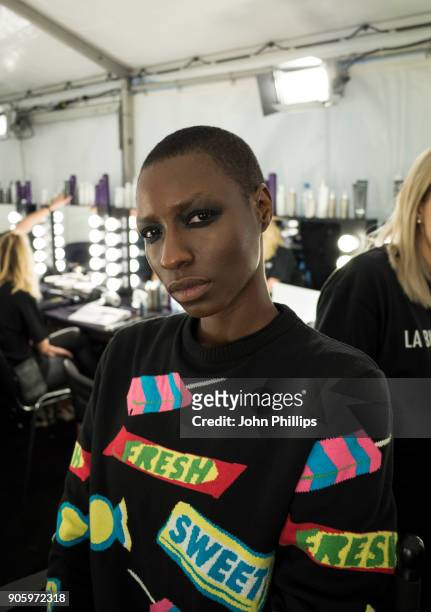 Models gets prepared backstage ahead of the Irene Luft show during the MBFW January 2018 at ewerk on January 17, 2018 in Berlin, Germany.