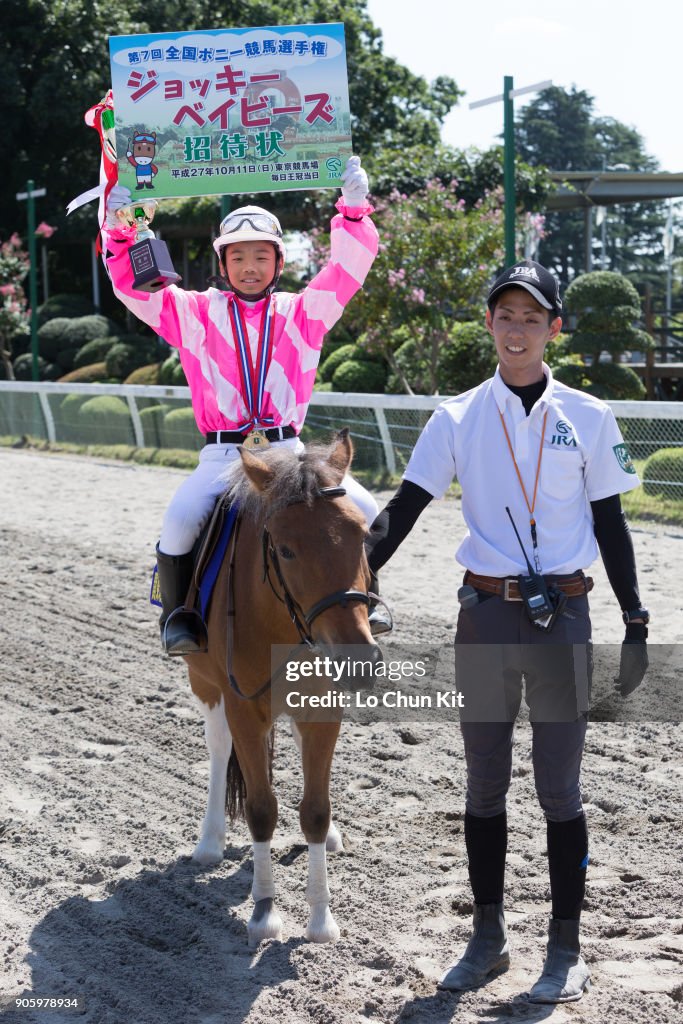 Jockey babies race at Baji Koen Equestrian Park in Tokyo, Japan