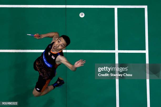 Lee Chong Wei of Malaysia in action with Kenta Nishimoto of Japan during the Men Singles round one match of the Perodua Malaysia Masters 2018 on...