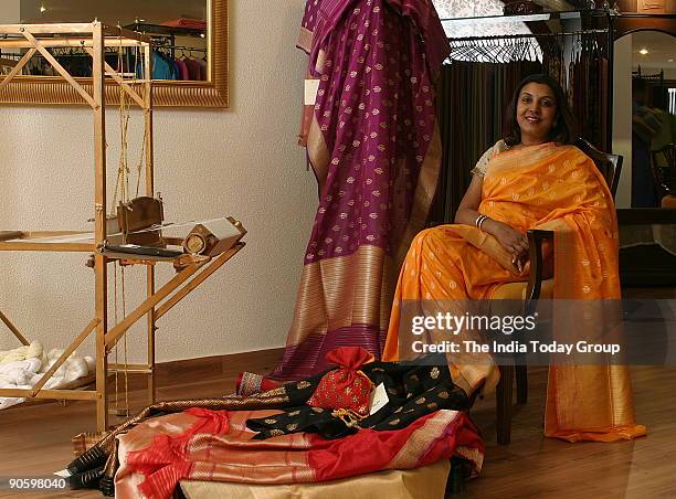 Vidhi Singhania, Indian Fashion Designer and well known as a revivalist of exquisite Kota and Banarasi saris/textiles posing at her flagship store,...