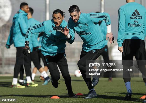 Keylor Navas and Kiko Casilla of Real Madrid exercise during a training session at Valdebebas training ground on January 17, 2018 in Madrid, Spain.