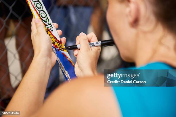 Emily Smith of the Hockeyroos signs autographs during game two of the International Test Series between the Australian Hockeyroos and Spain at...