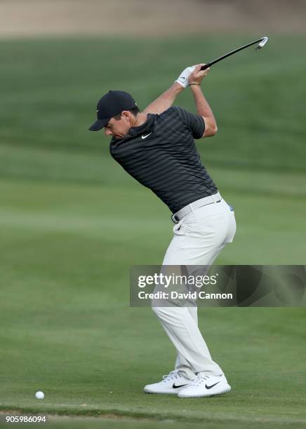 Rory McIlroy of Northern Ireland plays a shot on the 10th hole during the pro-am for the 2018 Abu Dhabi HSBC Golf Championship at the Abu Dhabi Golf...