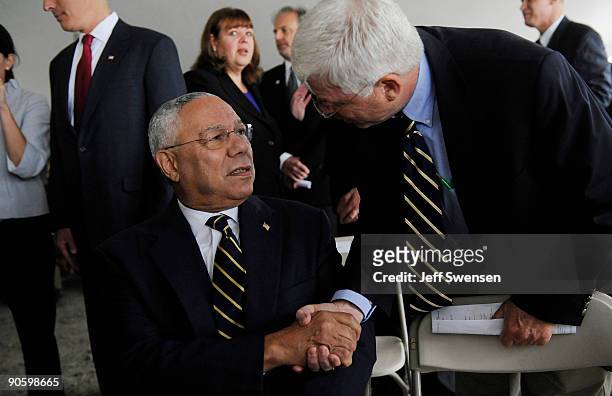 Former Secretary of State Colin Powell is greeted by a guest at the 8th anniversary of the September 11,2001 crash of Flight 93 September 11, 2009 in...