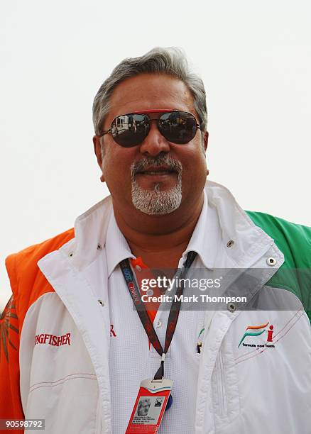Force India Chairman Vijay Mallya is seen in the paddock following practice for the Italian Formula One Grand Prix at the Autodromo Nazionale di...