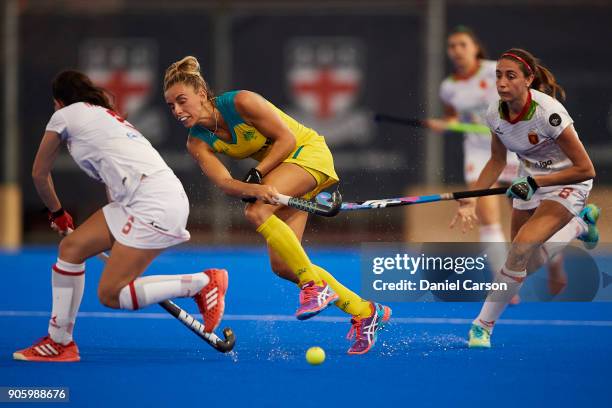 Gabrielle Nance of the Hockeyroos passes past Marta Grau of Spain during game two of the International Test Series between the Australian Hockeyroos...