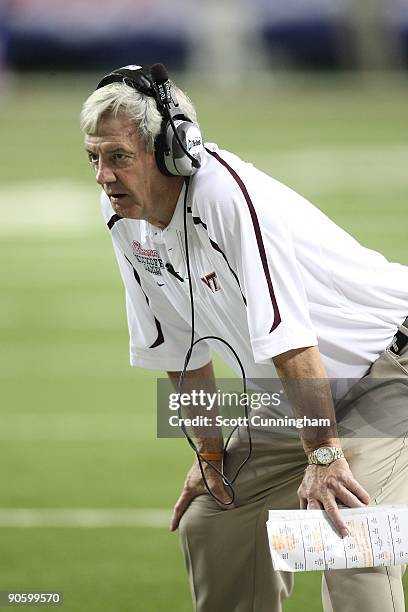 Head Coach Frank Beamer of the Virginia Tech Hokies watches the action during the Chick-fil-A Kickoff Game against the Alabama Crimson Tide at the...