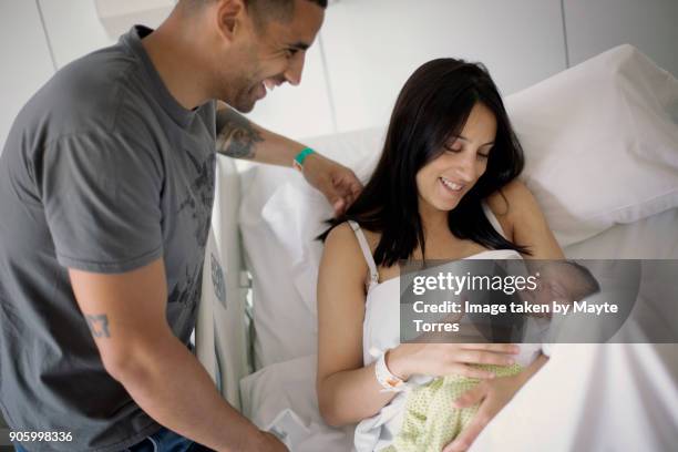 happy family with newborn at hospital - delicate tattoo stock pictures, royalty-free photos & images
