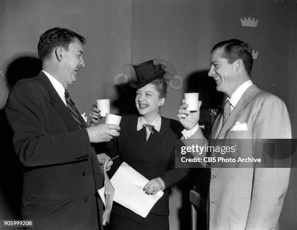 Radio drama series Hollywood Star Time adaptation of the theatrical film: Swamp Water. Pictured Left to right: Producer Bob Redd, Anne Baxter and...