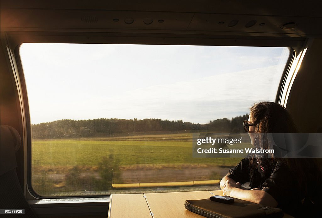 A woman on a train Sweden.